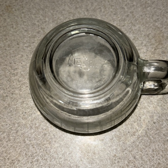 EUC 8 oz Nestle world mug with handle clear 3” depth 4” with handle 3” circum - Picture 5 of 7